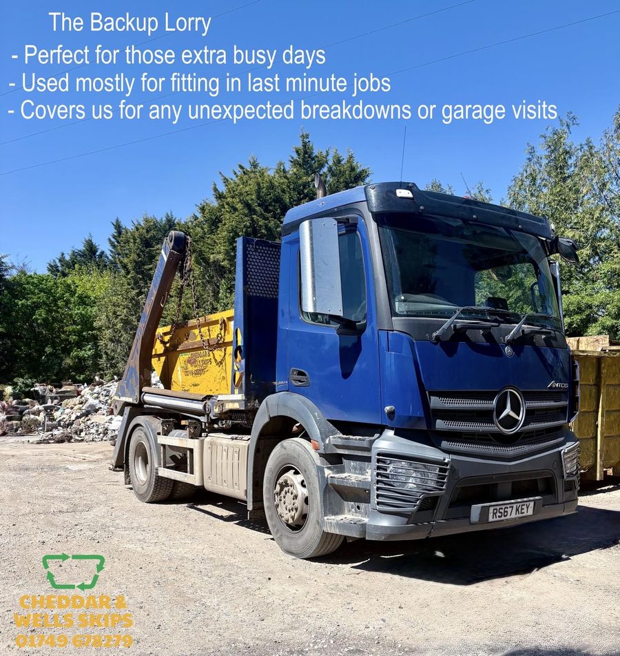 The backup skip lorry